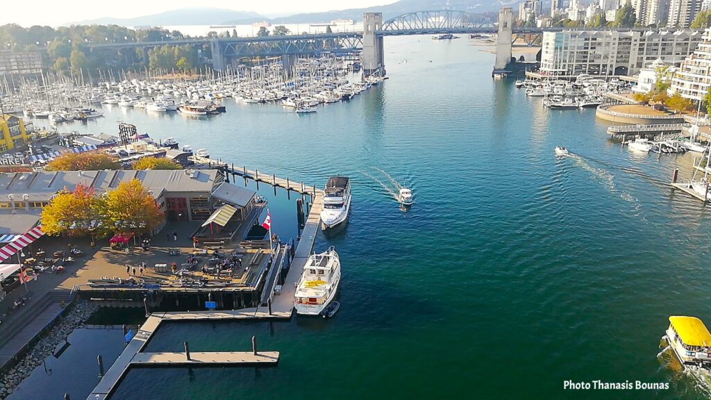 Granville Island from Granville Bridge A Sunlit View That Captures the Spirit of Vancouver - Photo By thanasis Bounas