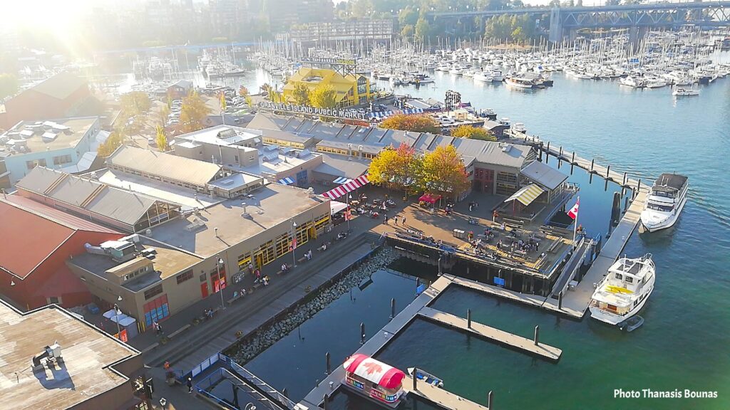 Granville Island from Granville Bridge A Sunlit View That Captures the Spirit of Vancouver - Photo By thanasis Bounas