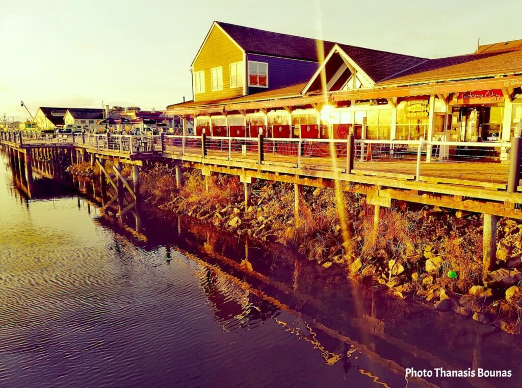 Sunset Reflections Walking the Boardwalk at Fisherman's Wharf - Photo By Thanasis Bounas