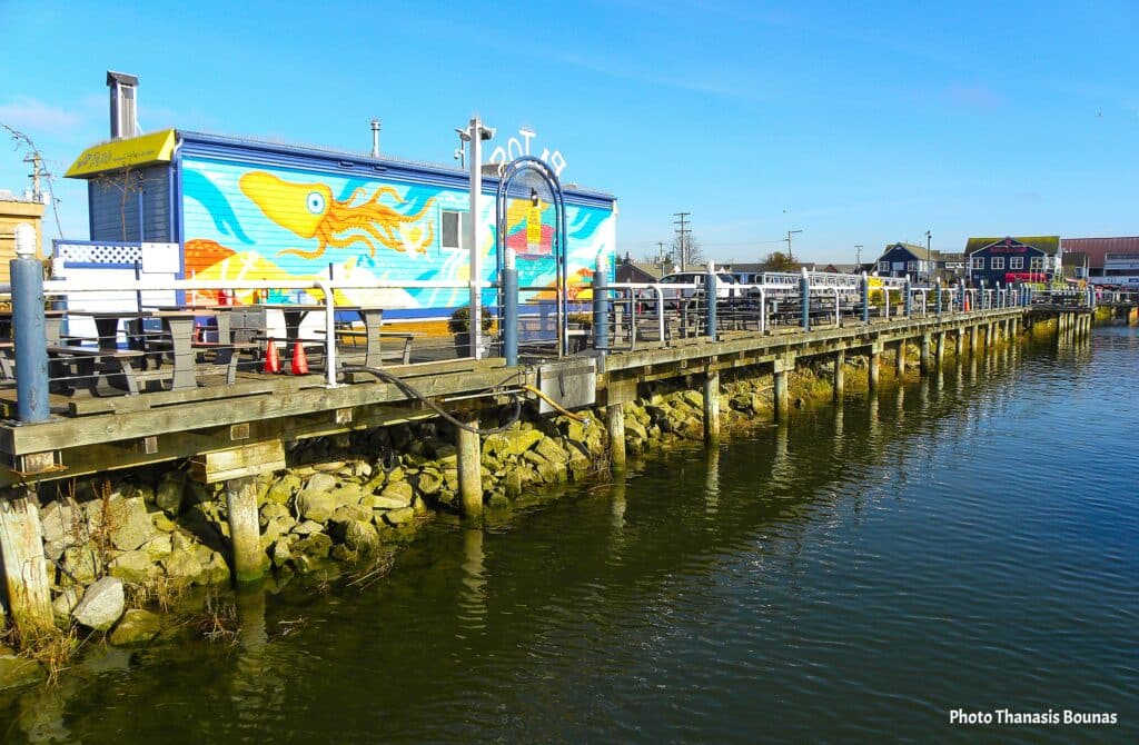 Sunset Reflections Walking the Boardwalk at Fisherman's Wharf - Photo By Thanasis Bounas