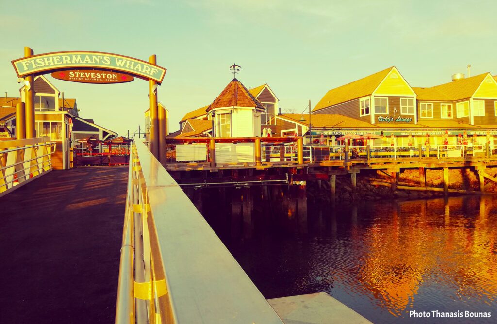 Sunset Reflections Walking the Boardwalk at Fisherman's Wharf - Photo By Thanasis Bounas