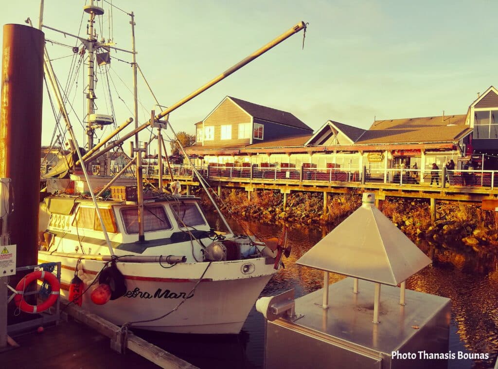 Sunset Reflections Walking the Boardwalk at Fisherman's Wharf - Photo By Thanasis Bounas